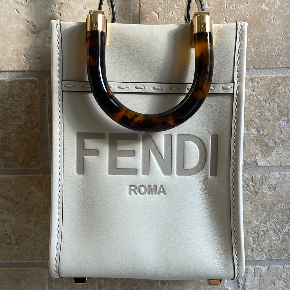 2021 FENDI mini sunshine shopper in Bianco Ice. Never carried.